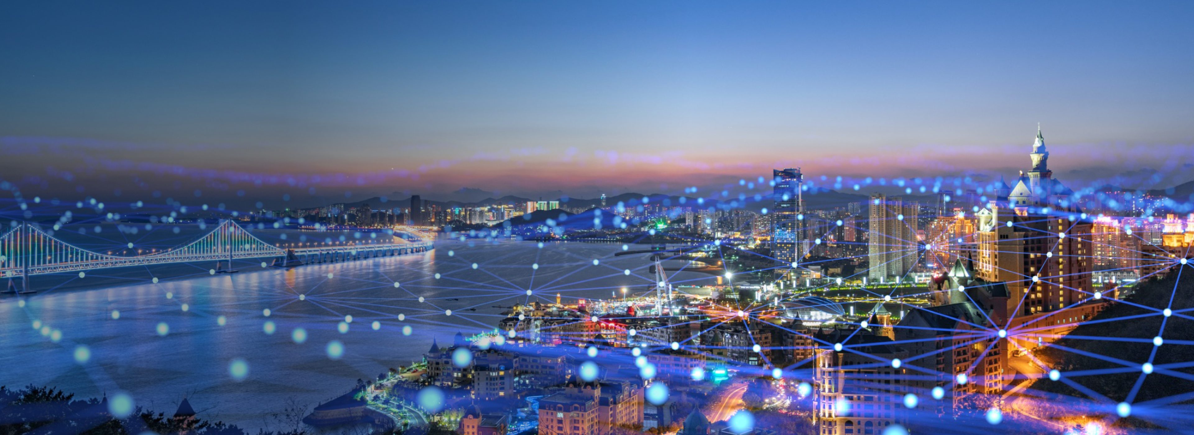 Cityscape showing a river, bridge and city skyline Cityscape showing a river, bridge and city skyline