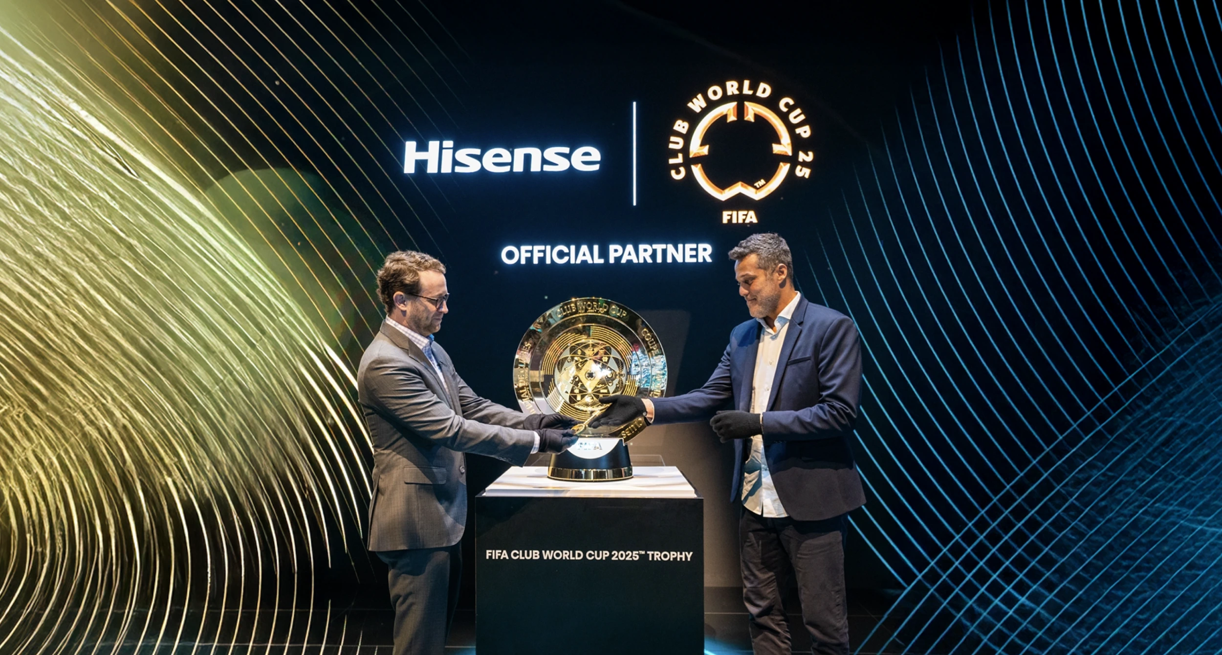 Hisense staff with Club World Cup trophy Hisense staff with Club World Cup trophy